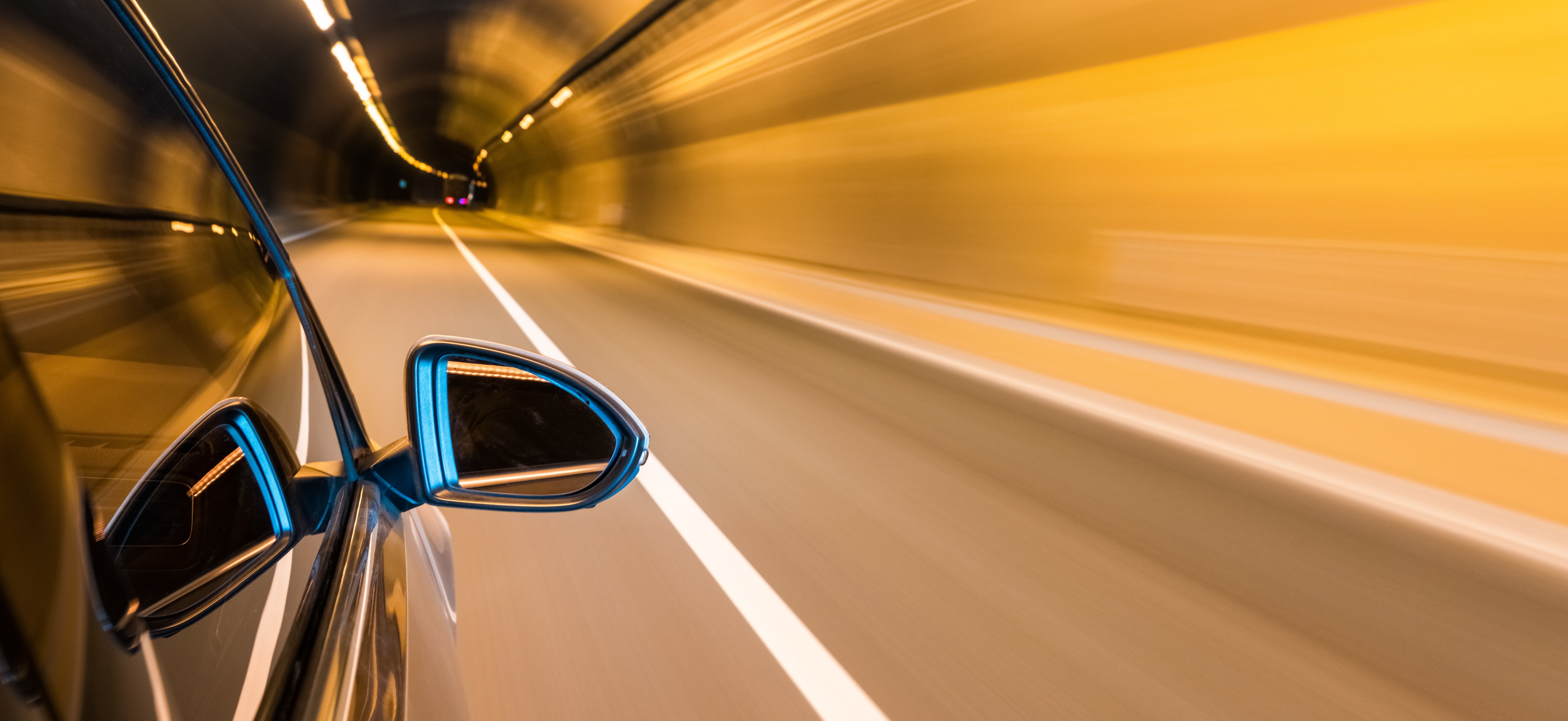 car-driving-with-tunnel-motion-blur-P8JQ4Z2-1