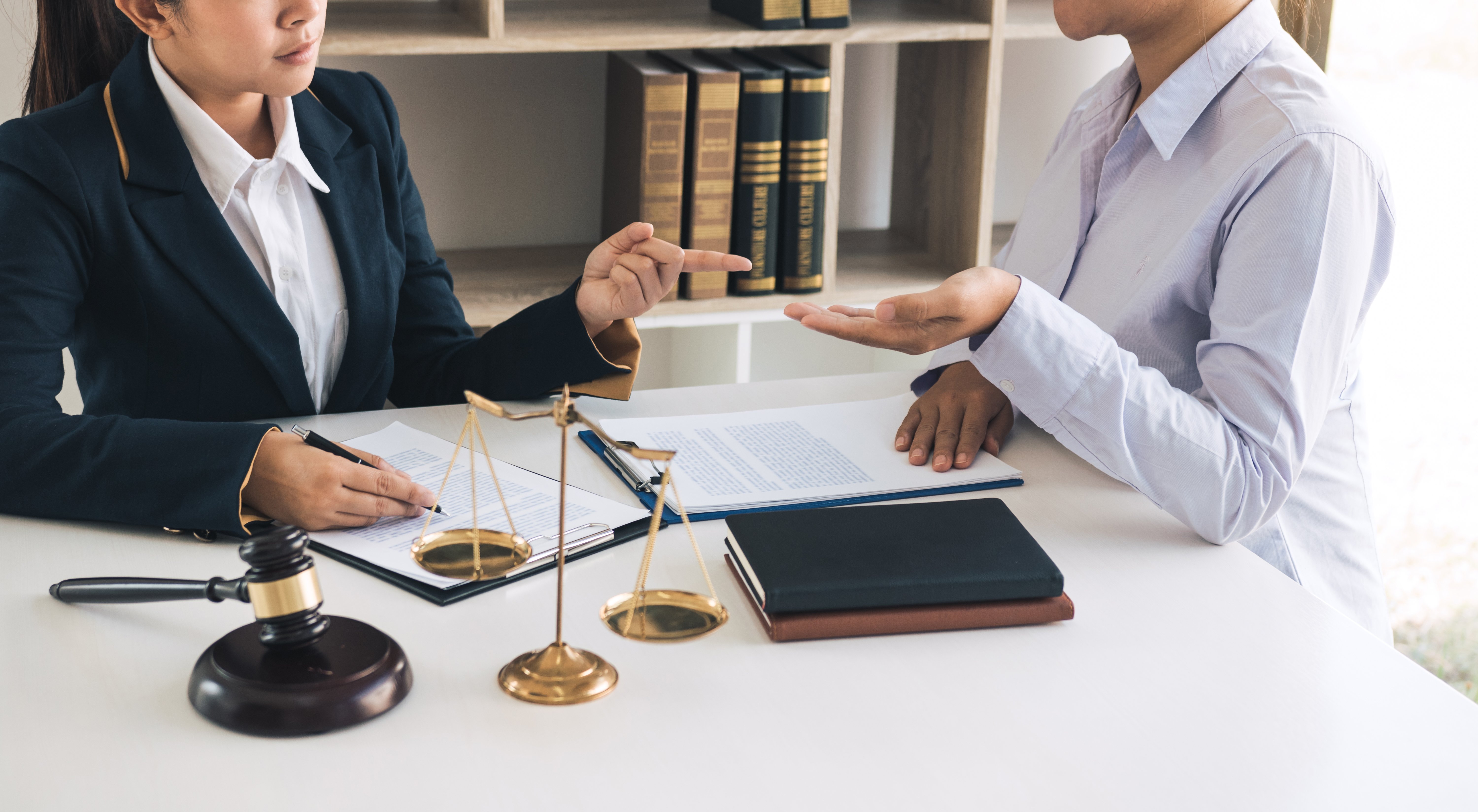 legal-advisor-is-explaining-the-offense-under-the--Y5DQ2B7
